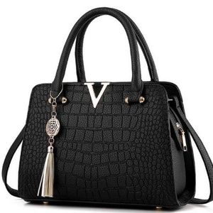 Beautiful crocodile leather handbag